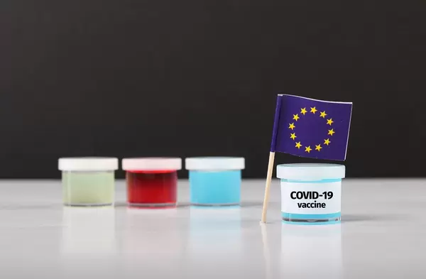 EU flag with Covid-19 vaccine