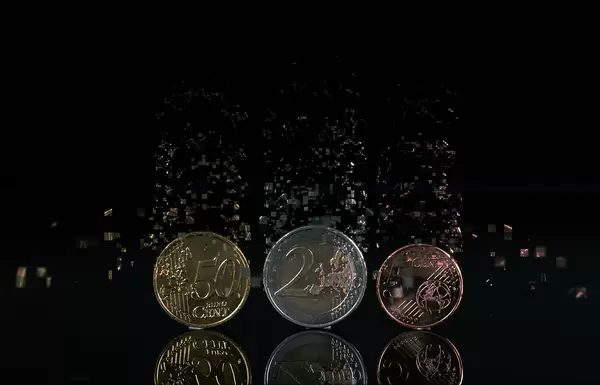 Euro coins tearing apart