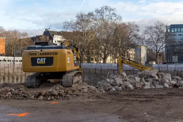 Excavator on construction site at Rudolfplatz in Cologne