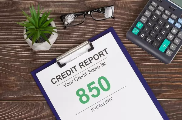 Excellent credit score report of 850 on office table
