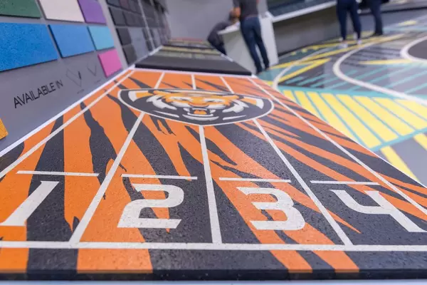 Exhibition of examples of floor coverings for fitness studios and workout spaces at Fibo in Cologne