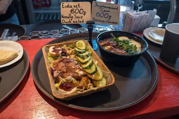 Exotic set: Noodle Soup and Duck Salad at Danilovsky Market in Moscow