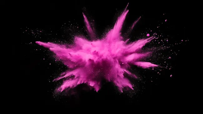 Explosives Farbspiel auf dunklem Hintergrund