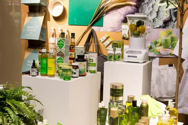 Fair display with healthy green supplements, care products and food