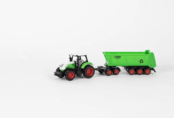 Farming tractor and trailer