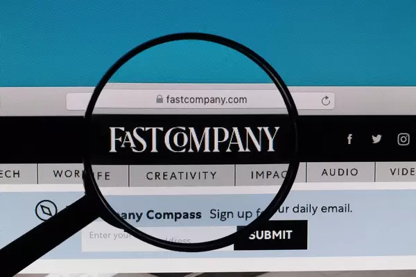 Fast Company logo under magnifying glass
