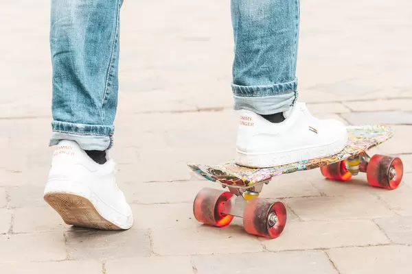 Feet on a skateboard, close up