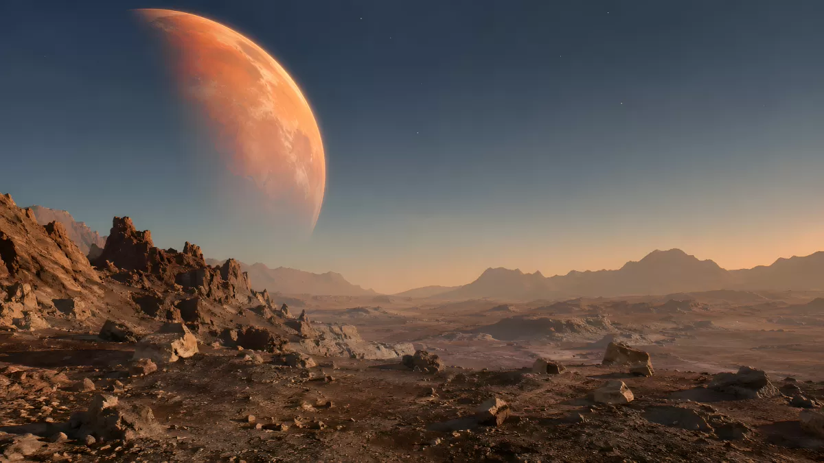 Felsige Marslandschaft mit rotem Planeten am Himmel