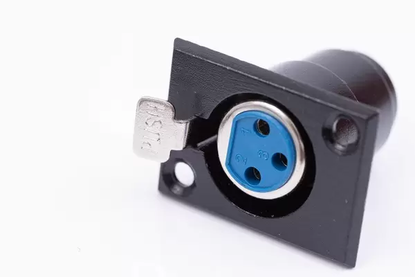 Female XLR Connector isolated above white background