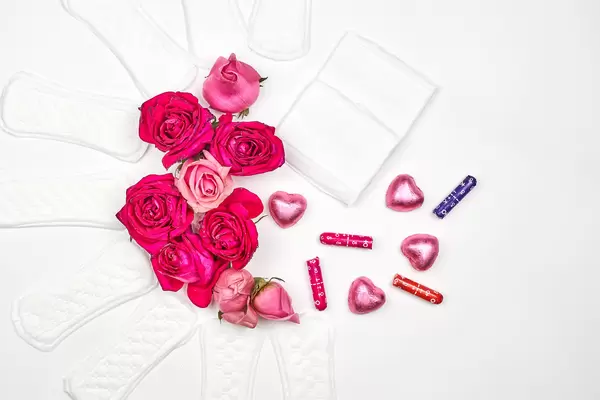 Feminine hygiene products on white background