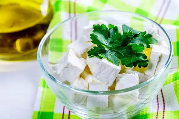 Feta cheese in a glass bowl  Flip 2019