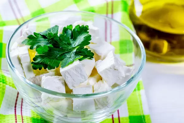 Feta cheese in a glass bowl