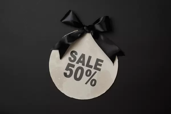 Fifty percent discount. 50 % sale banner with black banner