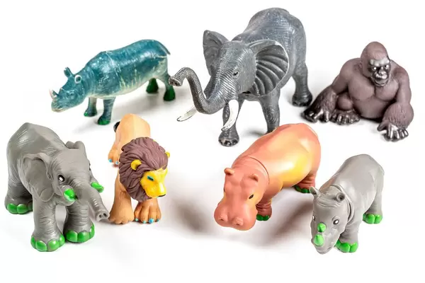 Figures of wild animals on a white background