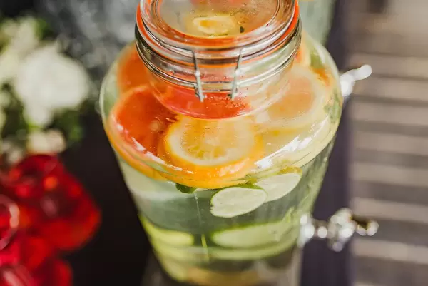 Filled Fruit Water Glass Botle With Oranges and Limes