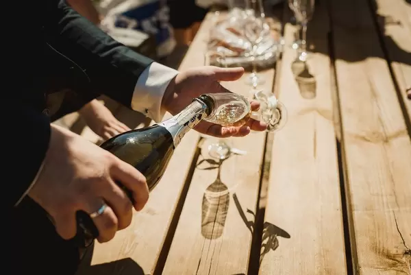 Filling Champagne Glass And Glass  Shadows