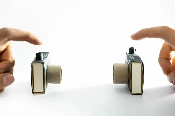 Fingers pressing the shutter in camera crafts