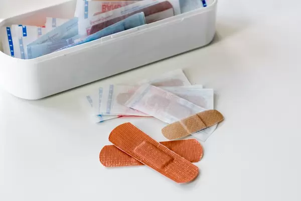 First Aid Kit with various sticking plaster