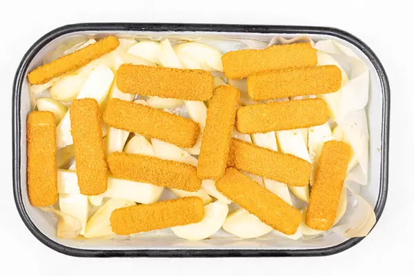 Fish Sticks ready for baking with potatoes