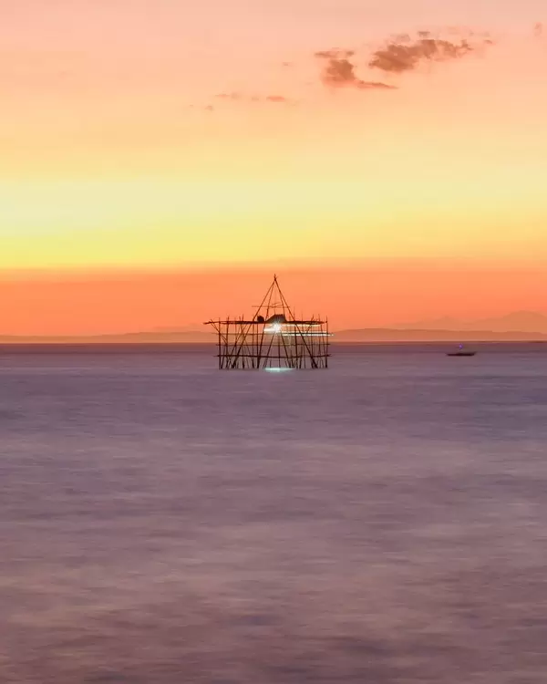 Fishing structures in Bacolod during sunset