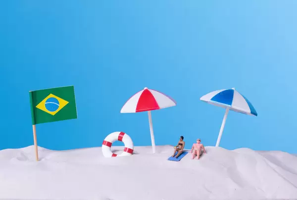 Flag of Brazil on the beach