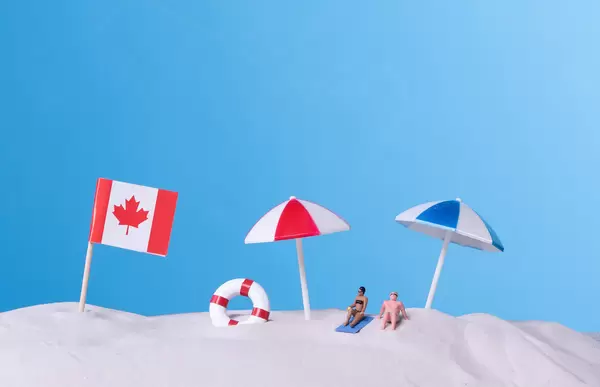 Flag of Canada on the beach
