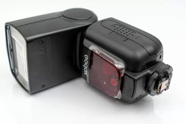 Flash light for photography camera isolated on the white background (Flip 2020)