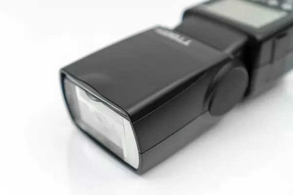 Flash light head for photography isolated on the white background