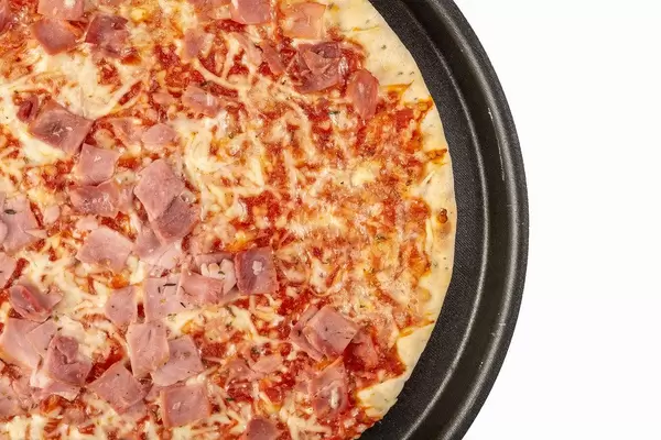 Flat lay above Baked Pizza with Ham (Flip 2019)