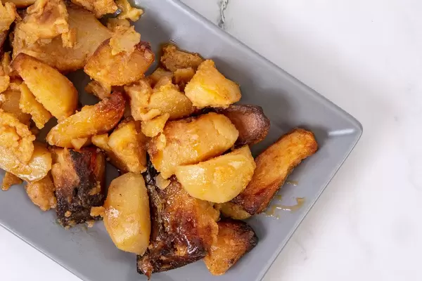 Flat lay above Baked Potatoes served on the plate (Flip 2019)