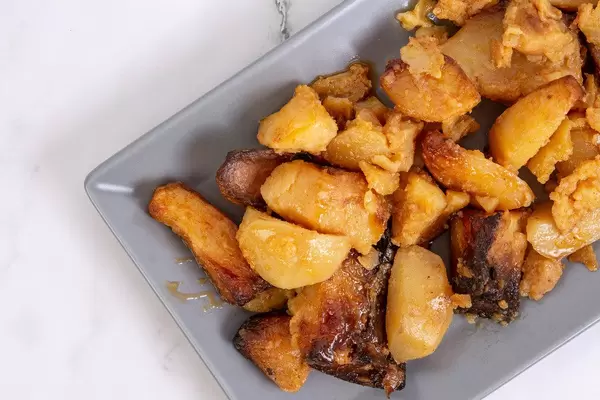 Flat lay above Baked Potatoes served on the plate