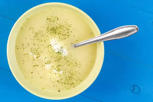 Flat Lay above Cauliflower Soup with sour cream (Flip 2019)