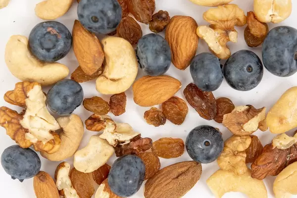 Flat lay above Crispbreads Blueberries Almonds Raisins and other