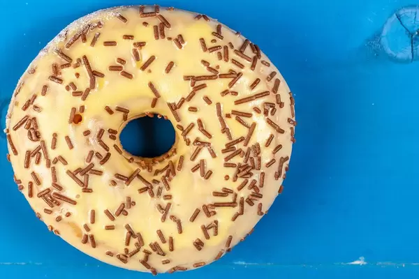 Flat lay above Donut with Vanilla topping (Flip 2019)