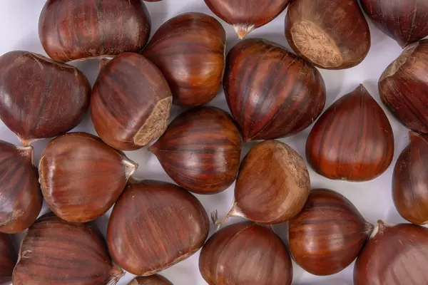 Flat lay above Fresh raw Chestnuts (Flip 2019)