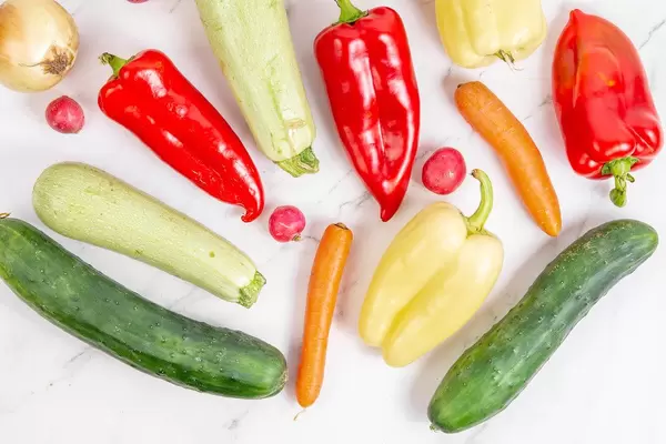 Flat lay above fresh vegetables on the table