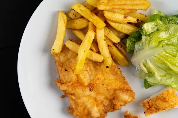 Flat lay above Fried Chicken Meat and French Fries