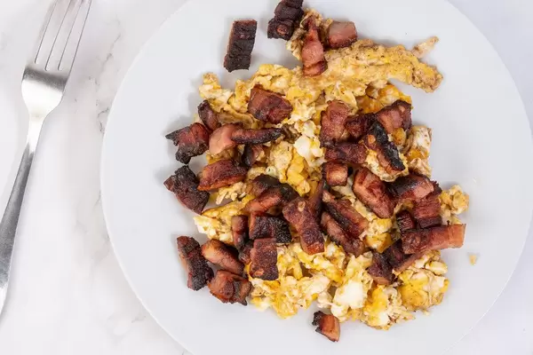 Flat lay above Fried Eggs with Bacon