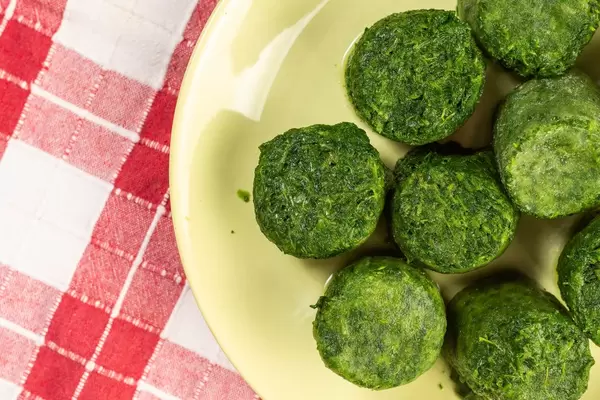 Flat lay above Frozen cubes of Spinach