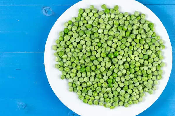 Flat lay above Frozen Green Peas
