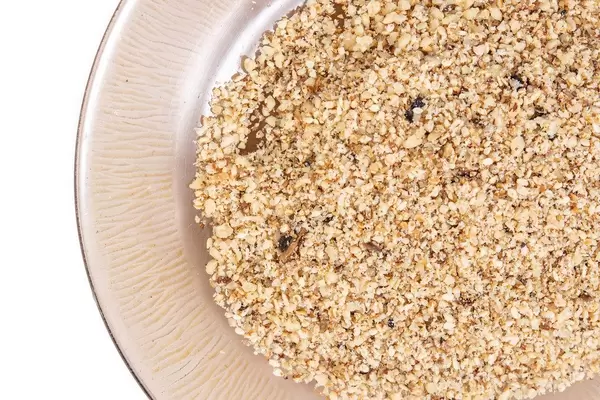 Flat lay above Grated Walnuts with Sesame