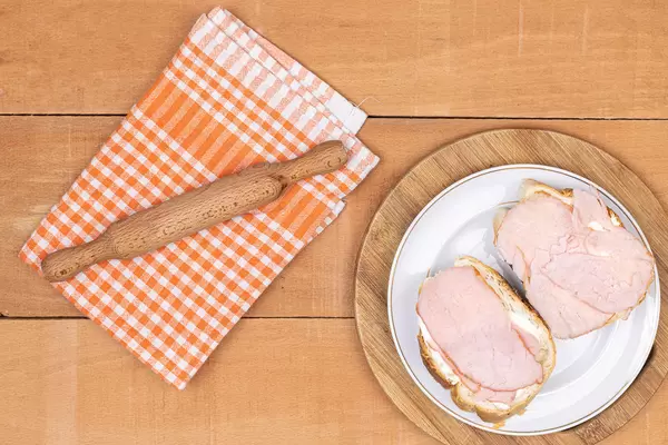 Flat lay above Ham Sandwiches on the plate