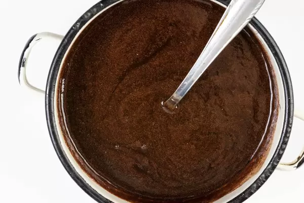 Flat lay above Melted Chocolate in the pot