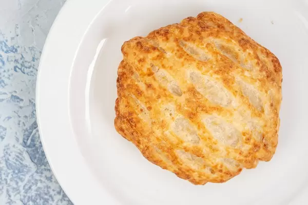 Flat lay above Pastry with Cheese and Ham