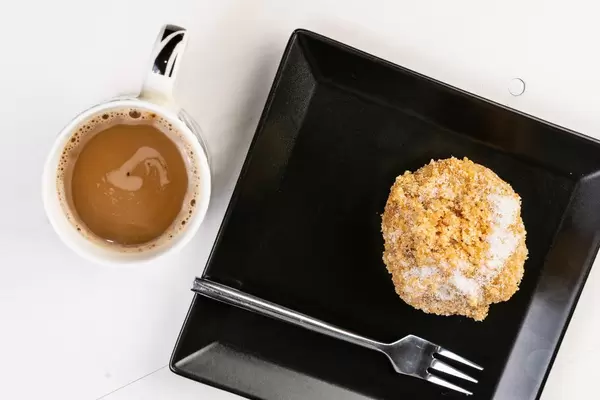 Flat lay above Plum Dumpling and Coffee Cup