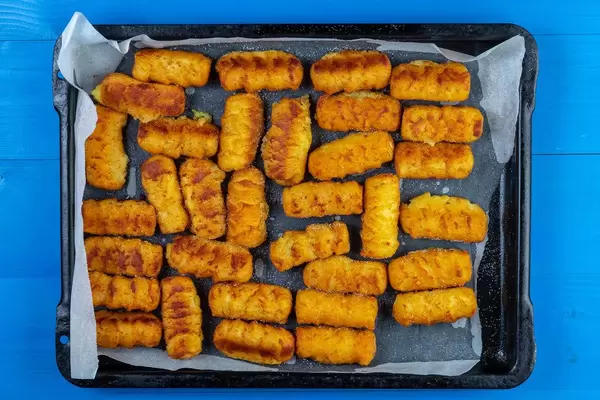 Flat lay above Potato Croquettes on the oven tray
