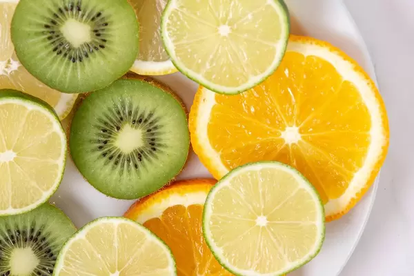 Flat lay above sliced Orange Kiwi Citrus Lemon (Flip 2019)