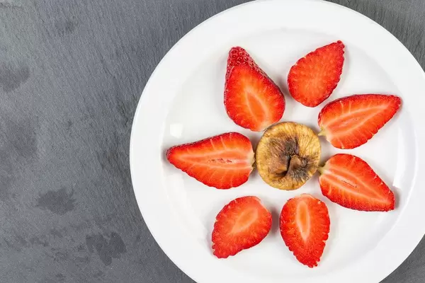 Flat lay above Sliced Strawberries with Dried Fig