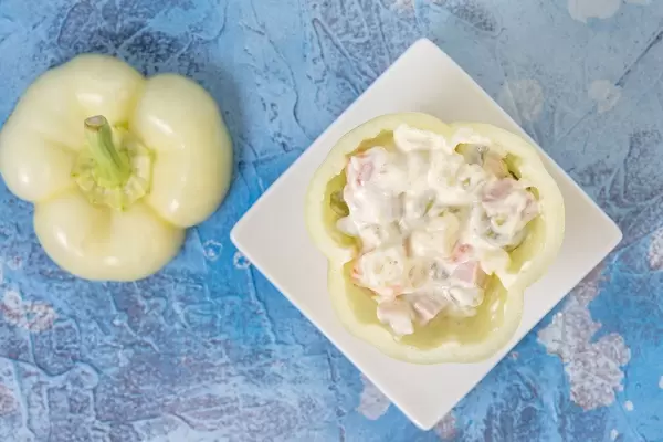 Flat lay above Stuffed Paprika with vegetables salad (Flip 2019)