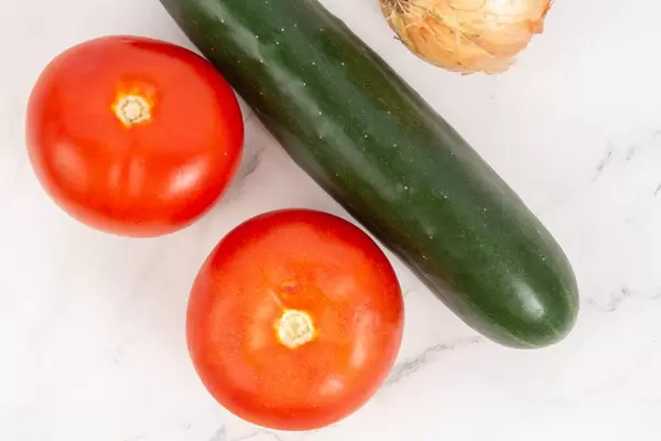 Flat lay above Tomato Cucumber and Onions